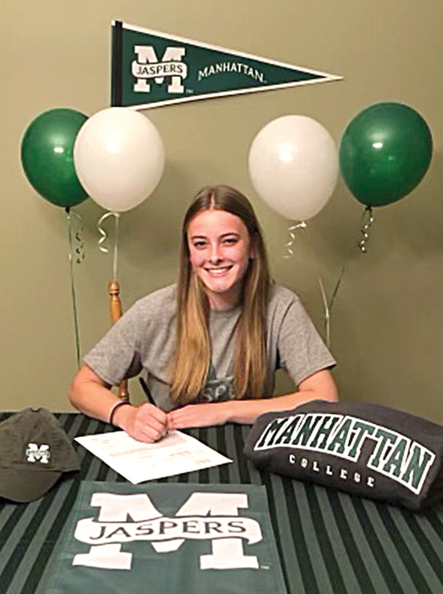 Valley Central senior Madeline Feller signs her National Letter of Intent to play Division I soccer at Manhattan College.